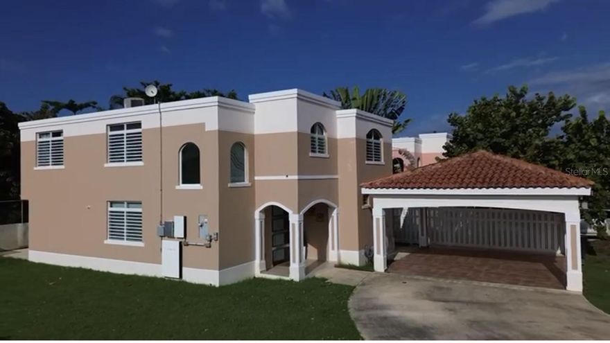 We present this elegant two-level residence, located in the exclusive gated community of Grand Palm 2, in the picturesque town of Vega Alta. This property combines spaciousness, privacy and a well resourced location, ideal for those seeking quality of life and comfort.

Key features of the property:
Two levels of construction.
Four (4) spacious bedrooms, perfect for family comfort and three (3) full bathrooms.

This Open-Concept design invites you to enjoy its spacious Grand Room, ideal for family gatherings or social activities. Likewise, the kitchen, which includes a separate walk-in pantry, offers ample storage space and is just across from the family room so that you can chat while making meals. The Family room double doors, open up as they provide access to the outdoor patio/backyard green area. The convenience of a full bathroom on the first level of the home assures the second-floor privacy. This Layout allows for a flowing transition as you move throughout the different spaces, creating a sense of comfort & amplitude. As a corner 529.24 sq/meter lot with no neighbors on the left side nor back of the property line, it provides privacy and multiple possibilities for outdoor area enjoyment or future improvements.

Community amenities:
Swimming pool
Gym
Tennis court
Half basketball court
Controlled access with security

Prime location:
*Proximity to Cerro Gordo beach, one of the most popular coastal destinations in the area.
*GPS clocks it at 1.3 miles from the beach
*Neighboring town with Dorado and within proximity of the Expressway, facilitating access to San Juan and other nearby municipalities.
*Shopping centers, private schools, and recreational areas are also within proximity.
This residence represents an excellent opportunity for those who want to live in a safe environment within a small community and with ample space and access to comfortable recreational facilities.