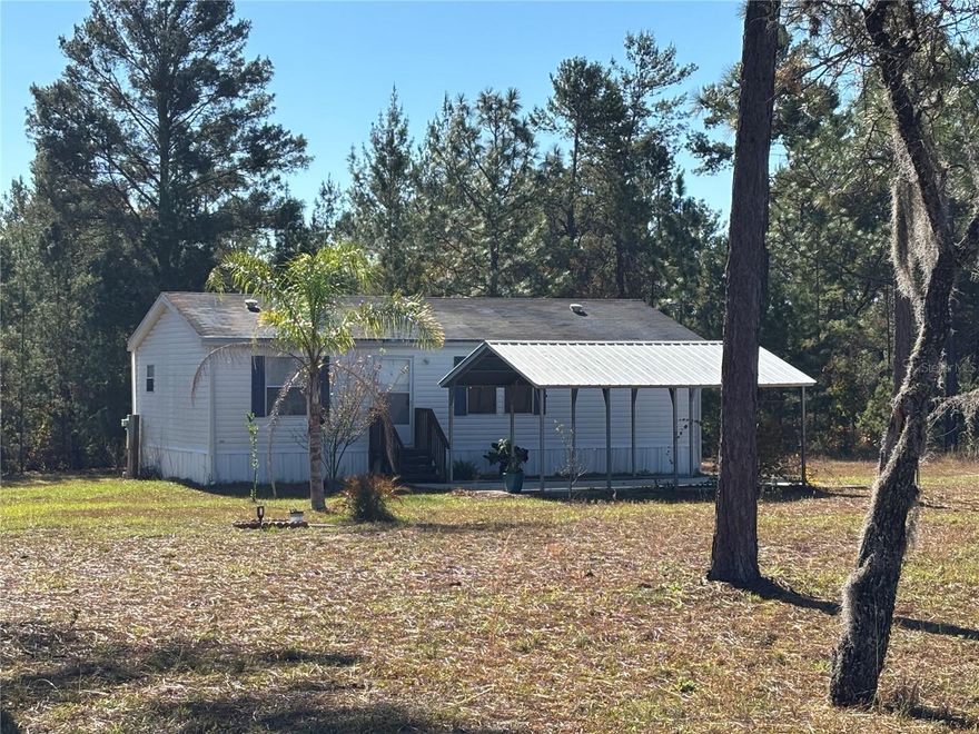 Under contract-accepting backup offers. Beautiful and impeccably maintained 2019 2BR/2BA mobile home situated on 2 acres in Melrose Landing. This move-in ready home offers a split floor plan with an open and inviting living area, perfect for comfortable everyday living. The spacious kitchen features a breakfast bar and dedicated dining area, ideal for gatherings. The primary bedroom includes a generous walk-in closet and a full ensuite bath, while the second bedroom is equally roomy. An inside utility room adds convenience and functionality.

The property provides plenty of room to enjoy outdoor activities, add future structures, or simply soak in the privacy and peaceful setting. This home is in immaculate condition and is perfect for first-time homebuyers, seasonal residents, or anyone seeking affordable, quiet rural living. A truly wonderful opportunity!