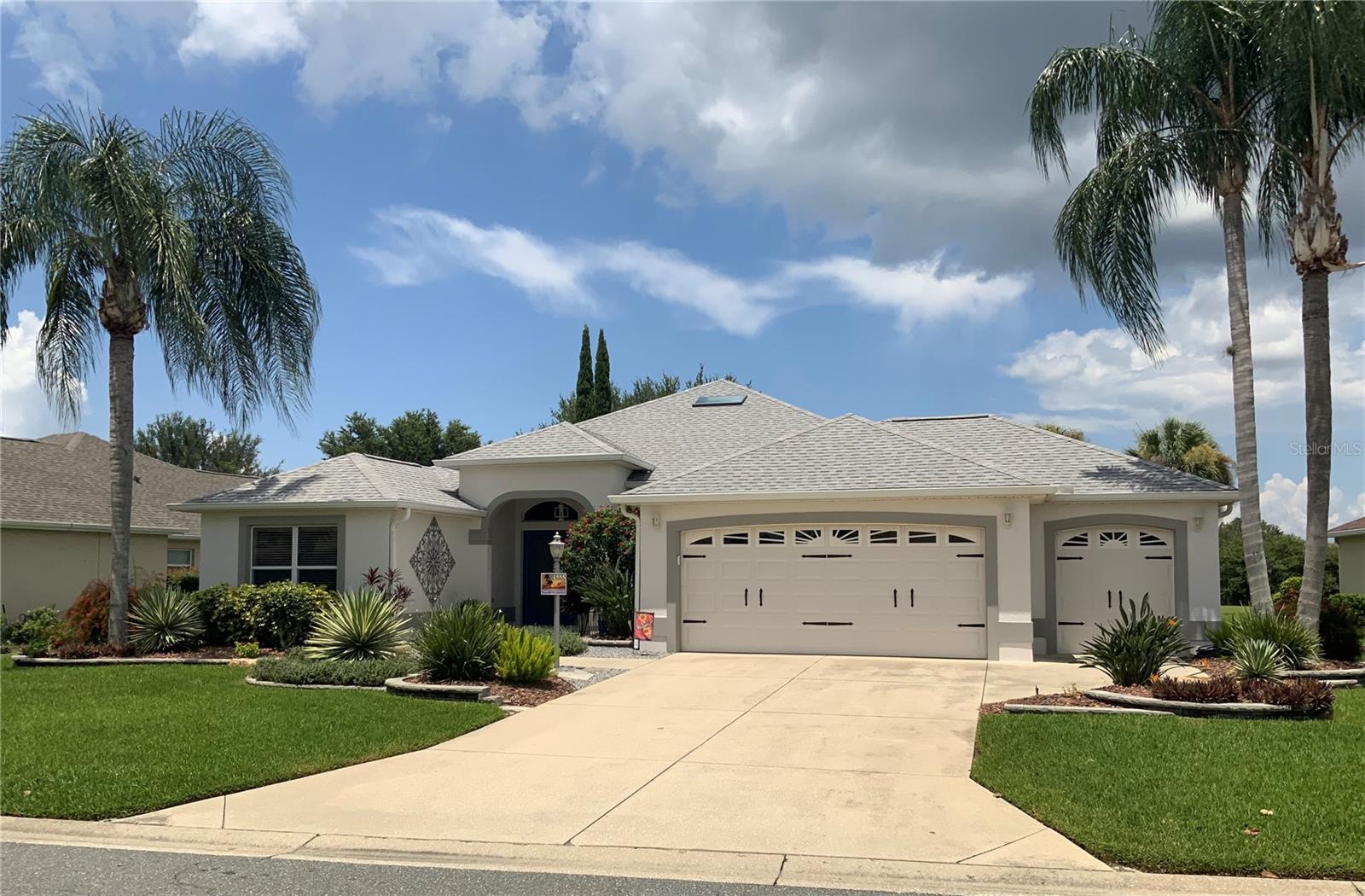 Welcome to this beautifully updated 3 Bedroom, 2 Bath Gardenia model, perfectly situated on a Championship Golf Course with breathtaking views and a private pool with a large screen enclosure. The home is professionally landscaped to allow just the right amount of privacy—without blocking the scenic fairway views.Step into the spacious, open layout, enhanced by the removal of a dining room wall, creating an expanded, airy feel ideal for entertaining or relaxed living spilling into the Living Room.Enjoy year-round gatherings in the large extended air-conditioned lanai, complete with a built-in Paradise Outdoor Grill and wine cooler.Inside, you’ll find luxury vinyl plank flooring, crown molding, and granite countertops throughout. The eat-in kitchen features a large Breakfast bar with upgraded GRANITE and under-counter stone, backsplash, and new stainless steel appliances (2023), under-cabinet lighting, and a whole-home water filtration system.The Large Main Bedroom Suite offers dual walk-in closets, dual vanities, and a remodeled shower a true private retreat.Bedroom 2 is multifunctional with a built-in desk, Murphy bed, and extensive cabinetry—perfect for guests or workspace flexibility.The front bedroom, originally without a closet, has been extended to include one if wanted.Additional upgrades include a new roof (2023), HVAC system (2024), water heater (2020), 3 solar tubes, and fresh interior and exterior paint.A generously sized 2-car plus golf cart garage that fits 2 cars + 2 golf carts rounds out this move-in ready home, offering a perfect blend of comfort, style, and Florida lifestyle living! NO BOND!