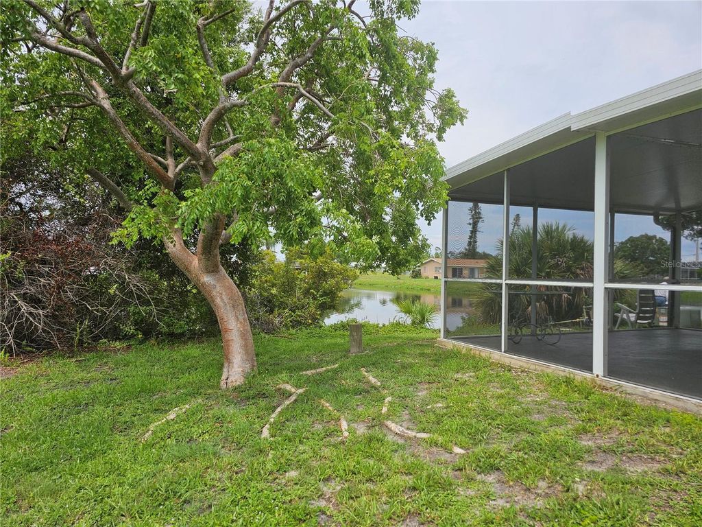 Photo of 50 Boundary Boulevard #B, Rotonda West, FL 33947 (MLS # D6144248)