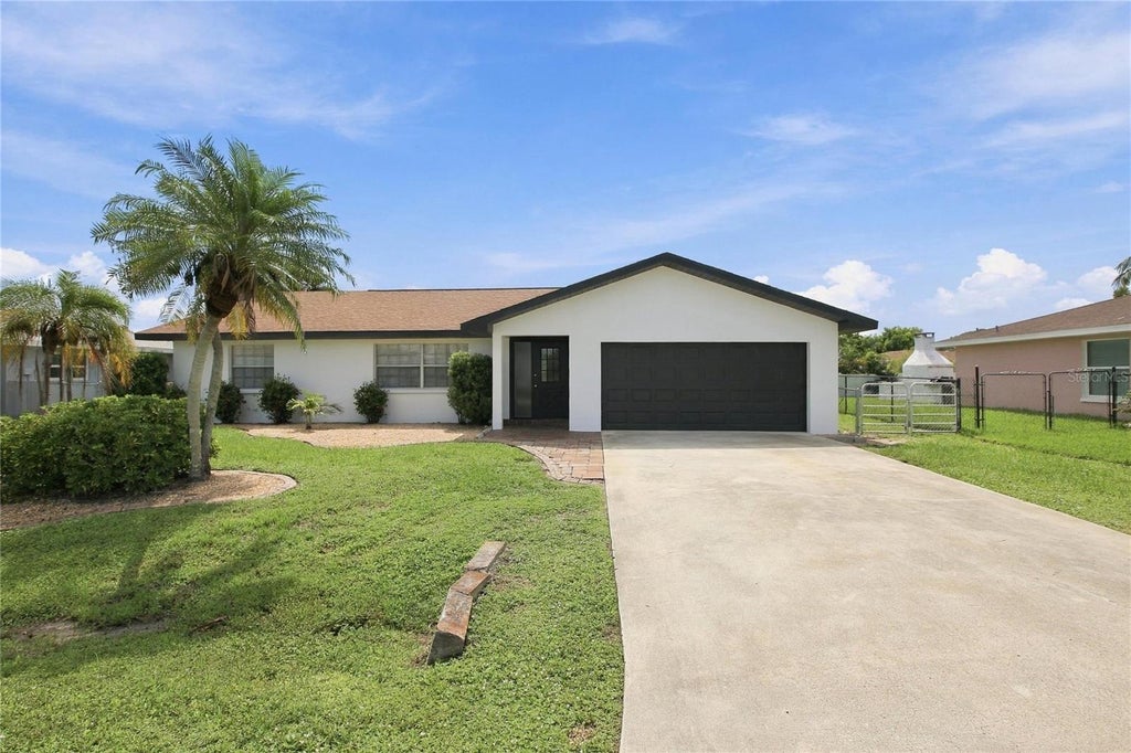 Photo of 7402 Sea Island Road, Fort Myers, FL 33967 (MLS # C7530458)