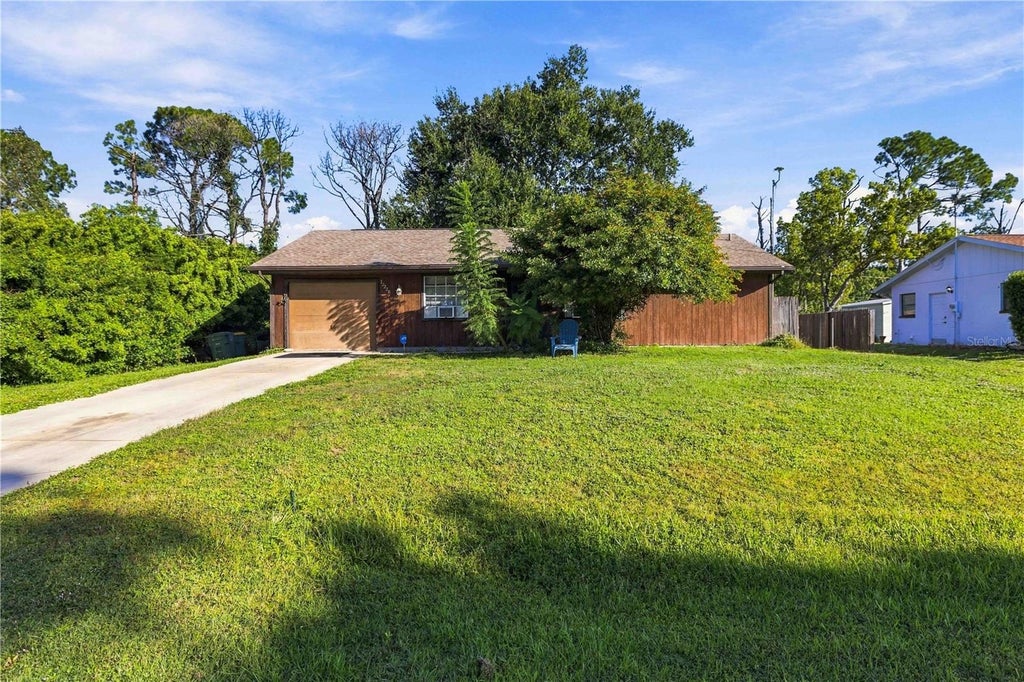 Photo of 12228 Morton Avenue, Port Charlotte, FL 33953 (MLS # D6149228)