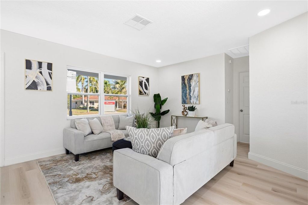 Photo of 214 45th Avenue NE, St Petersburg, FL 33703 (MLS # O6378881)