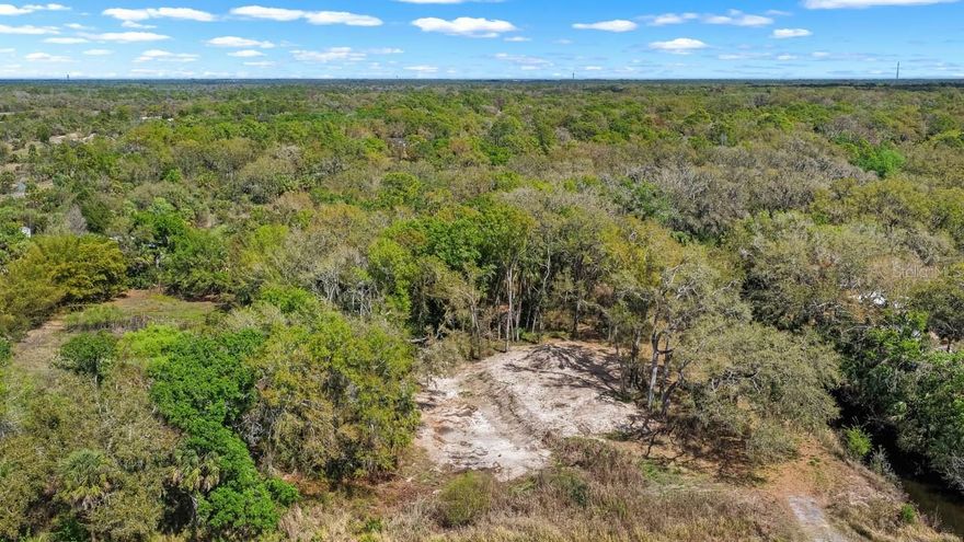 Build your dream home on this beautiful 2.76-acre residential homesite in the sought-after equestrian community of Sundance Trails in Wimauma, Florida. This spacious lot offers the perfect blend of privacy, nature, and country living, while still being conveniently located near major highways, shopping, and dining. Environmental delineation has already been completed and the property has been cleared through the Environmental Protection Commission (EPC), making this a fantastic opportunity for buyers looking for a build-ready property with important environmental steps already addressed. Sundance is well known for its equestrian-friendly lifestyle and expansive homesites, giving homeowners plenty of space for horses, barns, workshops, and outdoor living. The community features a low annual HOA and offers unique amenities including access to the Sundance Marina with private boat ramp, fishing, picnic areas, grills, and restroom facilities.
Residents also enjoy Sundance Park with walking paths, open green space, playground areas, and outdoor recreation facilities, creating a peaceful rural setting with room to roam. For horse enthusiasts, Sundance Stables offers barns, stalls, a round pen, practice arena, and multiple fenced pastures. Conveniently located near I-75 and US-301, this property provides easy access to Tampa, Sarasota, major airports, shopping centers, and Florida’s Gulf Coast beaches, while still maintaining the charm and tranquility of country living. If you’ve been searching for vacant land in Wimauma, acreage in an equestrian community, or a large homesite to build your custom home, this property presents a rare opportunity. Don't miss your chance to own 2.76 acres in one of South Hillsborough County’s most desirable rural communities