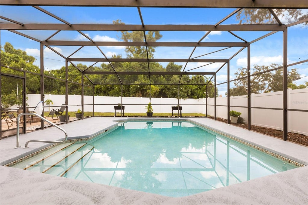 Photo of 1974 E Cooper Drive, Deltona, FL 32725 (MLS # O6450773)