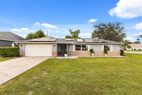 Photo of 1974 E Cooper Drive, Deltona, FL 32725 (MLS # O6450773)