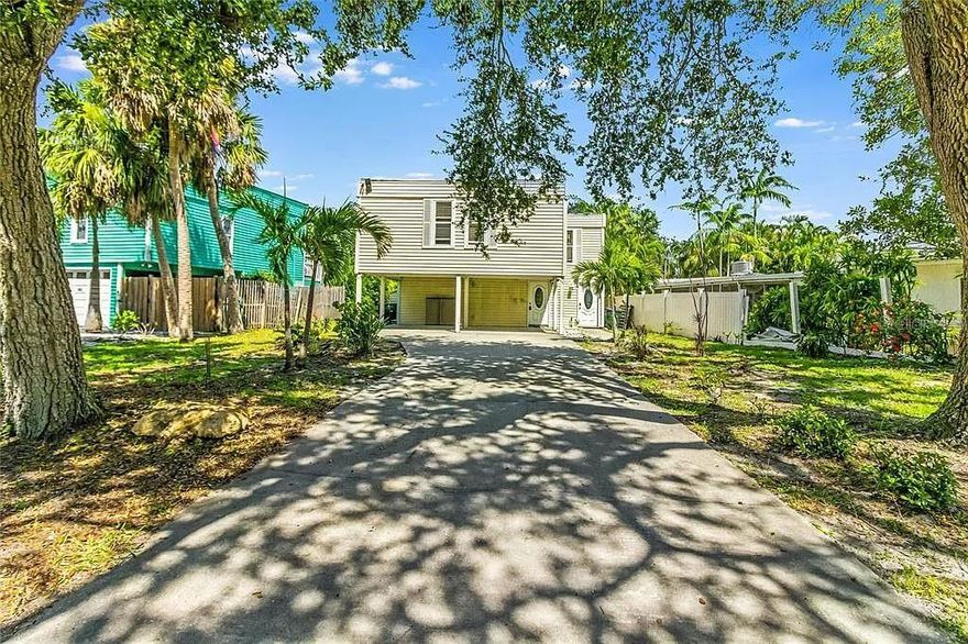 Opportunity to build your dream home and/or income producing property near world famous Siesta Beach!Being sold for lot value only. The present structure is a tear down due to roof leaks during past hurricane. Optional plans are available for a custom "to be built" home with a pool for $1,996,000.