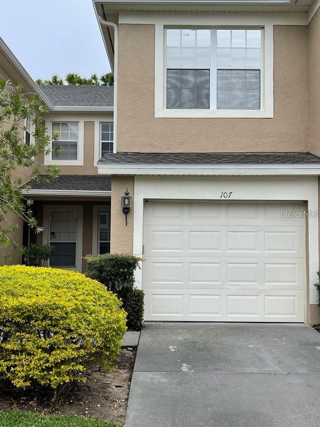 Photo of 6443 Axeitos Terrace #107, Orlando, FL 32835 (MLS # O6393312)