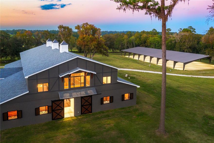 Victory Avenue is a truly exceptional 64+ acre horse farm located on the famous 225A! Just 10 minutes from WEC, the property sits right in the middle of what many consider to be the most highly desired horse country in all of Marion county. 
With magnificent rolling hill views and a live oak canopy lined driveway, this farm has everything an equine enthusiast could want. 
Including a brand new beautiful 5,180 sq ft 10-stall horse barn just recently built in 2022, a 2nd 10,000+ sq ft 18-stall horse barn that was just completed in 2023. Additionally, we have a brand new 120x250 ft irrigated covered riding arena finished with the industry leading GGT footing expert, Longwood.  The main residence is a beautiful 4,400 sq ft 5 bed/ 4 bath home, completely renovated, all new fixtures and appliances, 2 person sauna and more. 
Whether you are looking for your own private equine retreat or perhaps venturing into your own horse business, this property comes with an county approved site plan for an additional 2 guest cottages or maybe that dream home that you've been waiting to find just the perfect piece of land to build it on, this property is what you've been looking for!