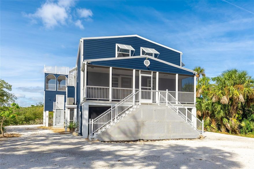 Discover a truly one-of-a-kind coastal retreat in the desirable Gull Cay subdivision of Palmetto, FL! This exceptional multi-level property offers endless possibilities for multigenerational living, short- or long-term rentals, or a conforming 4-plex investment. As you arrive, a secure gate and circular drive welcome you, surrounded by lush natural beauty and offering ample open parking. There’s generous space to park your boat, multiple cars, and even an RV—with a full hook-up including 50-amp electrical service—making it perfect for coastal living enthusiasts. A double staircase with durable Trex composite decking leads to the elevated first level of the home, setting the tone for the character found throughout.

The lower-level features two separate units—one a 1-bedroom, 1-bath studio and the other a 1-bedroom, 1-bath with a full kitchen—ideal for guests, extended family, or income-producing opportunities. The main floor offers 3 spacious bedrooms, 2 bathrooms, a kitchen with refrigerator and stove, washer and dryer, abundant storage closets, and a versatile bonus room. Upstairs, the second level features a beautifully updated kitchen with refrigerator, stove, microwave, dishwasher, and new quartz countertops, along with a dining room, living room, 2 bedrooms, and a full bath.

Outdoor living shines here—relax on the screened-in patio deck or take in breathtaking panoramic views of the bayou, Terra Ceia Bay, and peaceful mangroves from the rooftop deck, where you can enjoy unforgettable Florida sunsets. With 7 bedrooms, 5 bathrooms, and 3,435 sq. ft. of living space, this remodeled property blends flexibility, comfort, and opportunity. Additional features include a new HVAC system (2024), corrugated metal roof (2005), and Bahama hurricane shutters. Ideally located near pristine Gulf beaches, marinas, waterfront dining, and with easy access to I-275 and I-75, this is a must-see property for those seeking a remarkable investment or a serene coastal lifestyle in beautiful Palmetto.