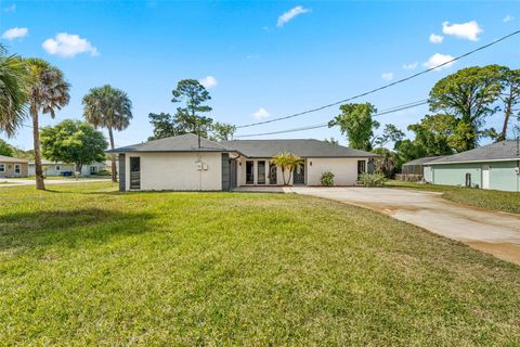 Photo of 117 Poinciana Road, Edgewater, FL 32141 (MLS # S5148582)