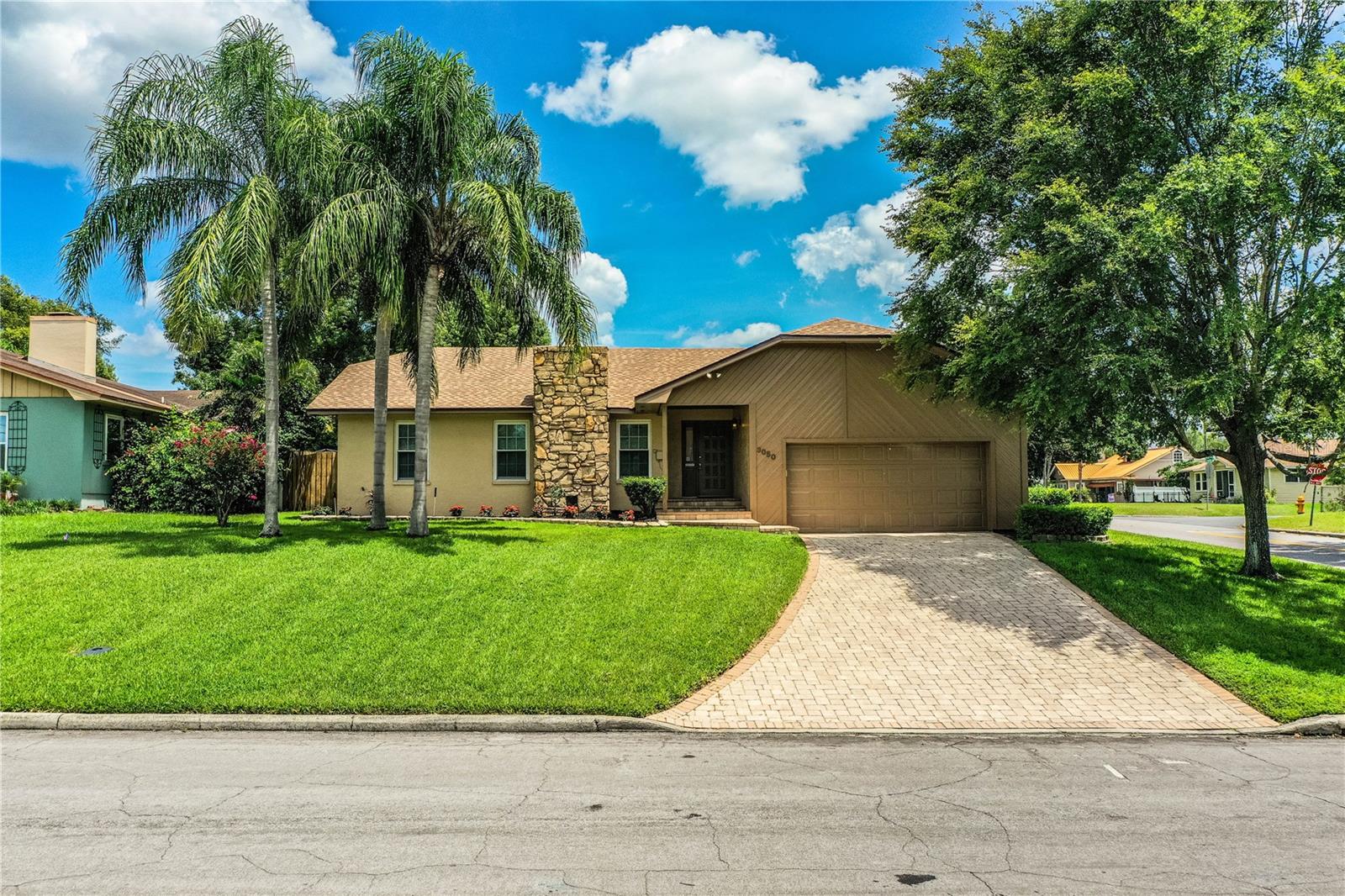 Great In-Town location for this 3 bedroom, 2 bath, 2 car garage split plan. This home features a large screened lanai with outstanding views from the great room, kitchen and primary bedroom! This property has great landscaping, is fenced, has a paver driveway/sidewalk and no HOA. The roof is brand new. Make your appointment today to see this nice property.