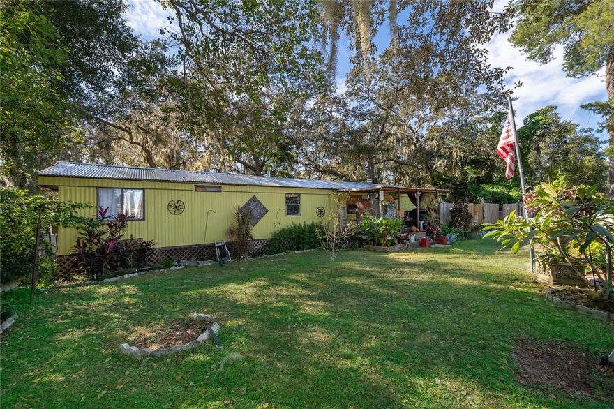 Welcome to this charming 2-bedroom, 2-bathroom home, perfectly positioned on a spacious half-acre lot and surrounded by natural beauty. With a brand-new septic tank already in place, this property offers both peace of mind and move-in-ready convenience. Nestled in the heart of Lake County—and just moments from Lake Eustis and several other scenic lakes—this home delivers the ideal blend of tranquility and accessibility. You’ll enjoy close proximity to boat ramps, restaurants, and everyday essentials, all while returning to the privacy of your own tree-lined retreat. Step inside to discover a cozy, inviting living space designed for comfort and relaxation. Whether you're seeking a full-time residence immersed in nature or a peaceful retreat to escape the everyday, this home provides the perfect setting to unwind and experience the best of Florida living. Call today to schedule your private showing.