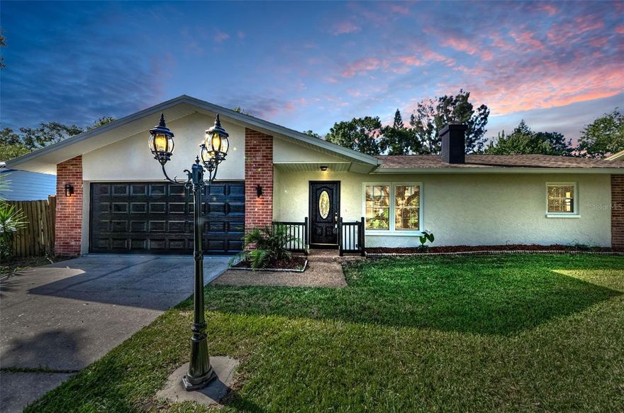 Welcome to this beautifully renovated 3 bedroom, 2 bath home located in the heart of Dunedin. From the moment you step inside, you’ll fall in love with the thoughtful updates and designer finishes throughout.

The gorgeous kitchen is a showstopper, featuring brand-new wood cabinets, stunning quartz countertops, stainless steel appliances, a double pantry, and antique brass hardware and faucet. The open concept living area is enhanced by a tranquil fireplace, creating the perfect ambiance for entertaining or relaxing at home.

The primary suite offers a spacious retreat, complete with an ensuite bathroom boasting a new vanity with quartz top, new lighting and mirror, a marble floor, and a stunning shower surround with antique brass fixtures and designer tile. Bedrooms 2 and 3 are tucked away in a split plan for privacy, with the guest bath equally impressive—showcasing a new vanity, quartz countertop, elegant tilework, and marble flooring.

But that’s not all! The enclosed and conditioned sunroom is lined with wall-to-wall windows overlooking your peaceful backyard oasis. Step outside to enjoy your inground pool with screened birdcage, and relax under the covered lanai that seamlessly blends into the outdoor space. The oversized backyard is spacious, private, and ready for your dream lifestyle.

All this, while being just minutes from downtown Dunedin, shopping, hospitals, dining, and more.

This home is the perfect combination of charm, luxury, and convenience—don’t miss it!