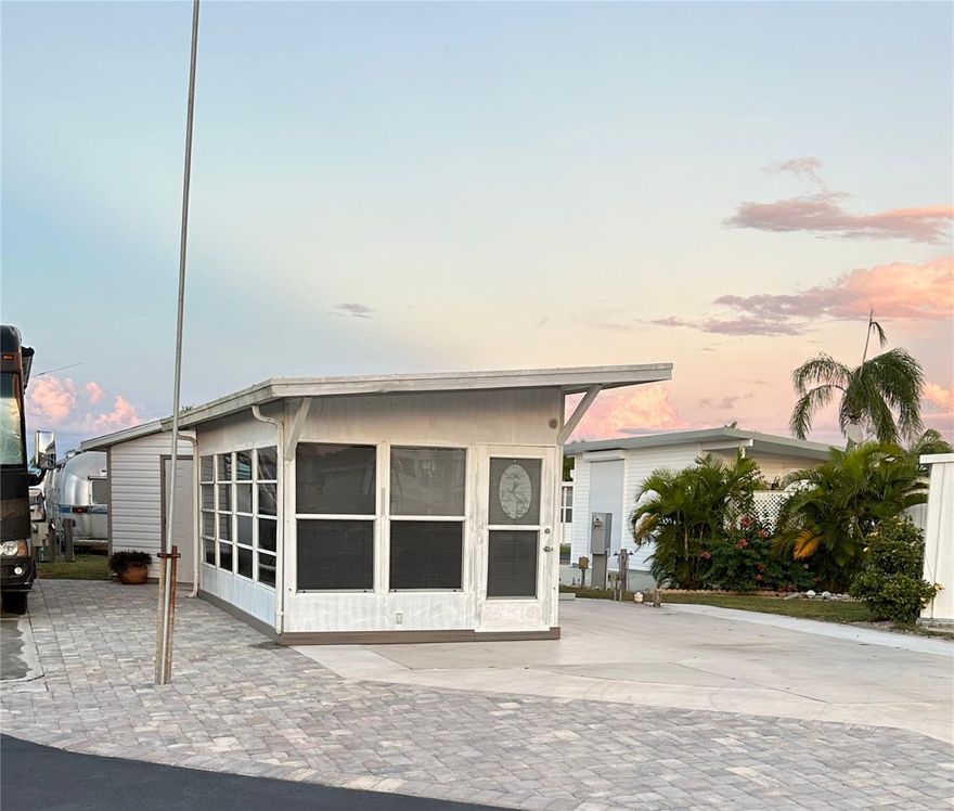 6900 Bermont Rd, Phase 2 - Unit 310, Punta Gorda, FL 33982 is in Paradise Park, a gated, pet-friendly 55+ community spanning 136 beautifully maintained acres. Our property features a Florida Room with electricity and mini split air conditioning.  This is extra living space! Also, new pavers enhance the aesthetic look of the property.  Perfect for your Airstream, Class A Motorhome. No 5th wheelers are allowed. It also includes an 8' by 10' shed room with washer/dryer, utility sink and refrigerator. Featured is the heated pool, clubhouse, and laundry facilities. The community post office is located right at the end of the street. Paradise Park is a vibrant lifestyle destination where residents enjoy a wide range of amenities, including: a 9-hole golf course; Expansive recreation hall; Billiard tables and a fitness center; Shuffleboard and bocce ball courts; and new this year pickleball.  A scenic 5-acre fishing lake; Metal and woodworking shops; On-site washers and dryers; Community fire truck; library; defibrillator; and a regularly published newsletter. Each resident owns an equal share of the communal areas, recreational facilities, and the private utility systems including the park's independently operated water and sewer treatment systems. The social calendar is always full, with activities such as: Craft and dance classes, Pool tournaments and entertainment nights, Sewing circles, bingo, card games, as well as Water aerobics and fitness programs. Schedule your visit next.
