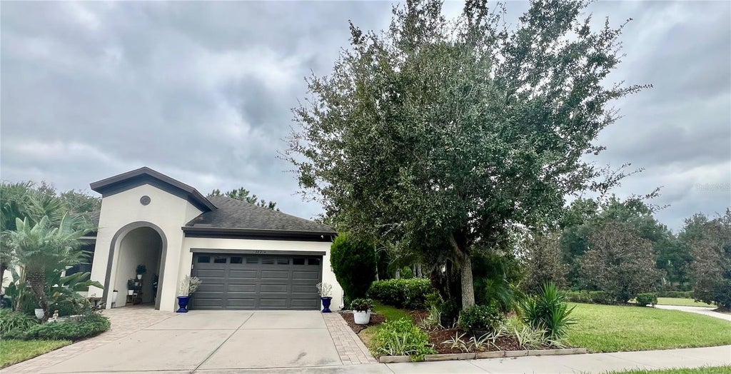 Photo of 32314 Natural Bridge Road, Wesley Chapel, FL 33543 (MLS # TB8562584)