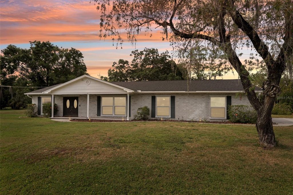 Photo of 1226 Debuel Road, Lutz, FL 33549 (MLS # TB8377307)