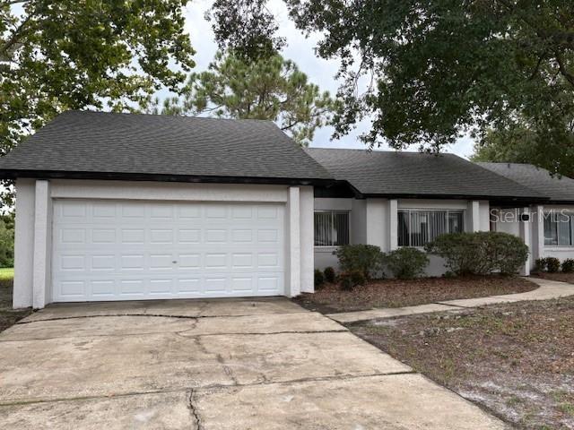 Lots of room in this spacious 3/2 split floor plan home. New interior paint, cabinetry and LVP. There is a living room, family room and separate dining room. This home is gorgeous both inside and out. Enjoy your evenings with the great view from the back patio. The floor plan is great for entertaining or a cozy get together in the family room. The kitchen is well appointed with a pantry and is nice and bright making meal prep a pleasure. A convenient location makes this home a must see!!