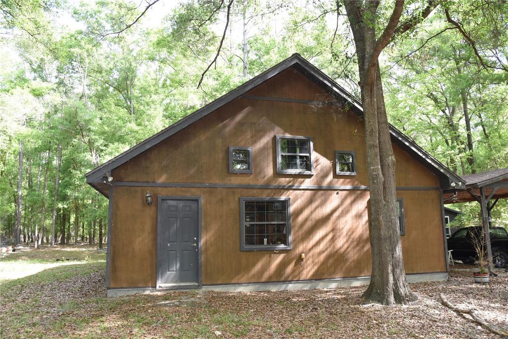 Photo of 1859 NE 46th Circle, High Springs, FL 32643 (MLS # OM723091)