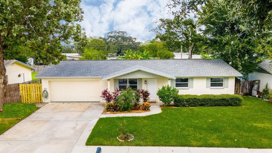 This move-in ready, 4 bedroom, 2 bath home with a 2 car garage and fully fenced yard in South Daytona has been renovated from top to bottom!  Upgrades and updates (completed in 2020) include a new roof, electrical panel, exterior doors, exterior paint, interior paint, carpet, stainless appliances, granite kitchen countertops, hall bath vanity, medicine cabinet, and lights, all closet doors, complete owner's bath renovation, and many more!   The front living room leads to an L-shaped kitchen.  The kitchen opens to an oversized family room which has ample natural lighting and a new remote-controlled fan and light fixture.  The owner's suite features a beautiful completely remodeled bathroom, including a tiled shower, new vanity, and new flooring.  Don't miss this gem!  All room dimensions, square footage, and other information intended to be accurate, but not guaranteed.  Buyer to verify. ;Water: City