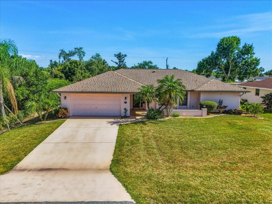 One or more photo(s) has been virtually staged. Please use ShowingTime to schedule all showings. Welcome to this beautifully maintained 2-bedroom, 2-bath residence offering a spacious designed layout that perfectly blends comfort and the relaxed Florida lifestyle. From the moment you arrive, the home immediately showcases pride of ownership with its mature landscaping, swaying palm trees, decorative landscape beds, and inviting curb appeal. Nestled in a desirable area of Port Charlotte, this property offers both tranquility and convenience while being centrally located near everyday amenities.
As you step inside, you are greeted by an expansive living room filled with natural light and designed to create a warm and welcoming atmosphere. The main living space flows seamlessly into the dining area, creating an open feel that is ideal for both everyday living and entertaining guests. Large sliding glass doors provide beautiful backyard views while connecting the indoor living areas effortlessly to the oversized screened lanai, enhancing the home’s open ambiance.
The kitchen serves as one of the highlights of the home, offering an exceptional amount of cabinetry and storage space along with well-positioned upper lighting that brightens the room. The functional design provides generous counter space for meal preparation while maintaining a comfortable connection. Just outside the kitchen, the breakfast nook is the perfect setting for casual dining.
Adding even more flexibility to the floor plan is the spacious separate family room, ideal for a secondary living area or additional entertaining area. This oversized room also offers convenient access to the lanai, continuing the seamless indoor-outdoor flow.
The primary suite is generously sized and designed to provide a peaceful retreat, complete with private access to the screened patio area. The ensuite bathroom features a comfortable layout with a walk-in shower and heated lamp for comfort. The guest bedroom is conveniently located near the guest bathroom, creating an ideal setup for visiting family or friends while maintaining privacy.
The laundry room is exceptionally spacious and practical, featuring abundant cabinetry, storage options, and folding space that helps keep household organization simple and efficient.
The true centerpiece of this property is the screened-in lanai overlooking the landscaped backyard. Offering abundant shaded space for outdoor seating, dining, and entertaining, this area creates the perfect environment for enjoying Florida’s beautiful weather. The backyard itself has been meticulously maintained with mature trees, palms, shrubs, and lush greenery that provide both beauty and a sense of privacy. The property also features a sprinkler system on a separate well with a brand-new pump.
Located in the heart of Port Charlotte, this home places you near a wide variety of shopping, dining, and entertainment options. Convenient access to nearby retailers including Aldi and numerous local restaurants makes everyday errands simple and accessible. The property is also located just a short drive from the newly developed Sunseeker Resort Charlotte Harbor, offering waterfront dining, entertainment, and resort-style amenities. Its central location provides easy access to both Punta Gorda and Englewood, allowing you to enjoy everything from charming downtown areas and marinas to Gulf beaches, boating, fishing, and coastal attractions. Quick access to major highways further enhances convenience for commuting and travel.