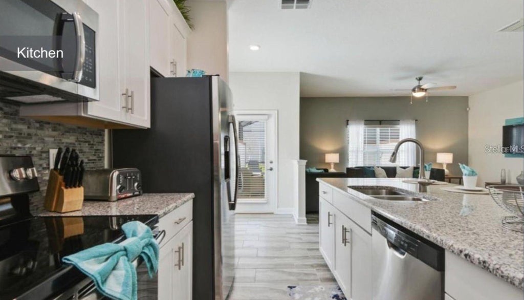 Photo of 1592 Slice Way, Davenport, FL 33896 (MLS # O6411636)