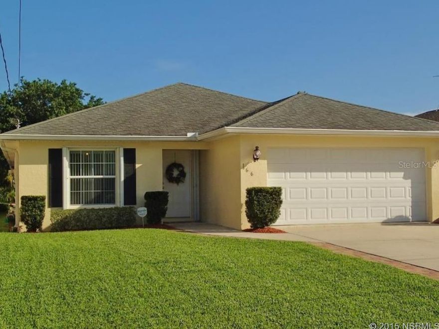 Immaculate waterfront home with boat lift in a world-class fisherman's paradise.  This home, yard, and dock are in gorgeous, like-new condition - a MUST SEE home perfect as a permanent residence or weekend getaway on the water. The home features 3 bedrooms, 2 bathrooms, double vanity in the master bathroom, 2-car garage, an inviting, spacious open floor plan with a large, sunny living room that opens to a covered patio and walkway to the waterfront deck and boat dock with boat lift (the current owner had a 23' boat in the lift). The home includes many nice upgrades such as custom closet storage systems, custom storage units in the garage, water softener, a monitored security system, 50 amp hookup for an RV on the widened driveway, and deluxe lockable hurricane shutters (including the patio). The AC and paint are new (2014), there is termite bond, and all appliance are included.  Incredible fishing areas frequented by professional fishing guides (and a waterfront bait shop) are just a few minutes away by boat - Bissett Bay, Slippery Creek, Hong Kong Island, Gaines' Slough, George's Bar, and of course Mosquito Lagoon. This is a fantastic, well-built, home in a perfect location for anyone who loves being on the water. ;Water: City