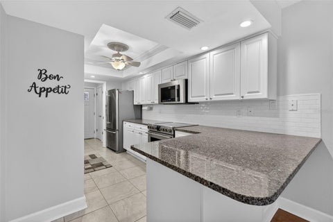 Tiny photo for 100 S Tremain Street #F1, Mount Dora, FL 32757 (MLS # G5105185)