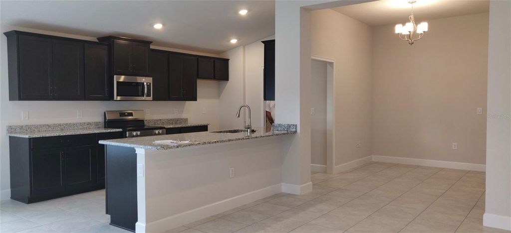 Photo of 5494 Ocean Breeze Drive, Spring Hill, FL 34609 (MLS # OM704254)