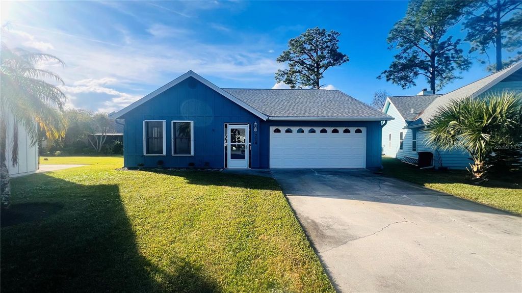 Photo of 714 Fox Tail Court, New Smyrna Beach, FL 32168 (MLS # V4945065)
