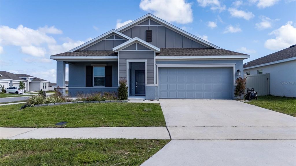 Photo of 401 Sandbar Ln, Haines City, FL 33844 (MLS # S5146835)