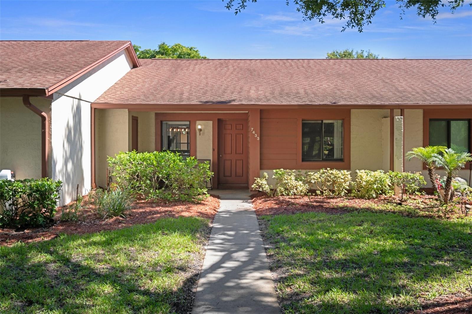 Come home to relaxed Florida living in a beautifully cared-for 55+ community where comfort, convenience, and charm meet. Tucked inside one of Hudson’s most welcoming neighborhoods, 7433 Greystone Dr. offers more than just 2 bedrooms, 2 baths, and 1,029 sq ft — it offers a lifestyle. With its bright layout, inviting Florida room, and thoughtfully furnished interior, this home feels both peaceful and practical from the moment you arrive. Enjoy low-maintenance living with cable and exterior upkeep included in the HOA, plus access to the club house at Beacon Woods Civic Center, where you’ll find a heated pool, fitness center, tennis courts, shuffleboard, and more. And for the golf lover, the nearby Beacon Woods Golf Club is always calling. With everything you need nearby, and a peaceful setting that feels like home, this is Florida living made simple. Schedule your private tour today — and come experience it for yourself.