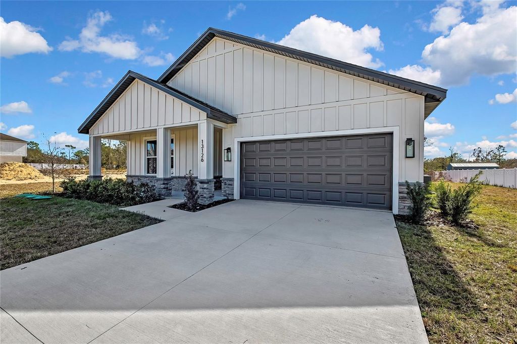 Photo of 13126 Meadow Swallow Avenue, Brooksville, FL 34613 (MLS # O6413874)