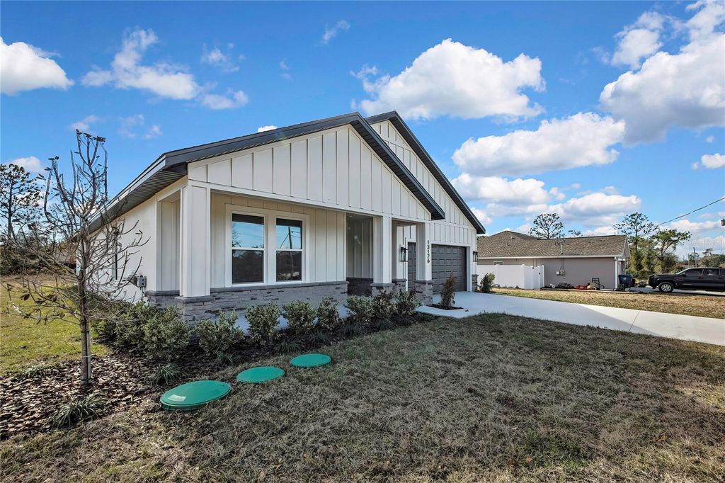 Photo of 13126 Meadow Swallow Avenue, Brooksville, FL 34613 (MLS # O6413874)