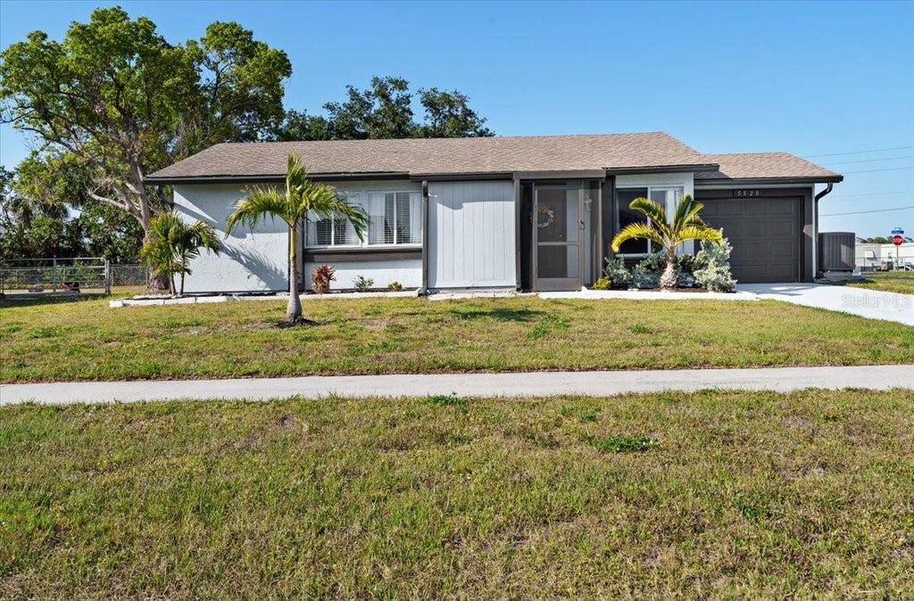 Photo of 5520 Kenwood Drive, North Port, FL 34287 (MLS # C7531256)