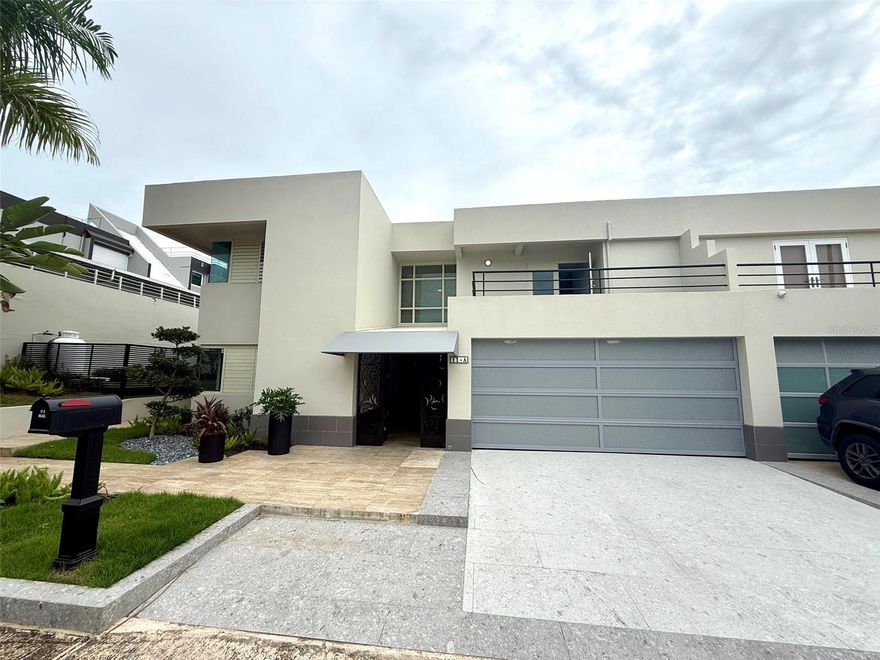 Tintillo, Guaynabo - nestled in a served double gated community offering privacy, security and easy access to main roads.Close access to private schools, highways, hospitals and great shopping and restaurant areas.