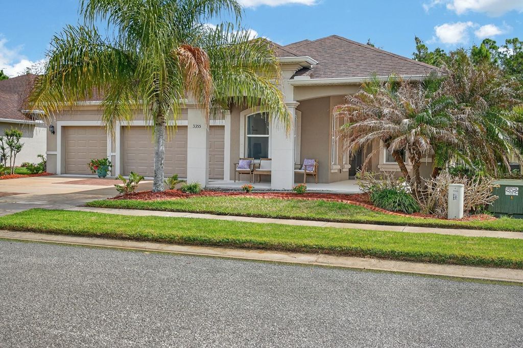 Photo of 3355 Bellino Boulevard, New Smyrna Beach, FL 32168 (MLS # V4948214)