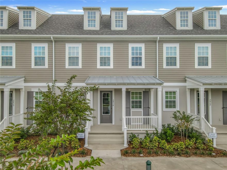 New Luxury Townhome in Celebration with All porcelain tiled floors. Island Village new construction
The Amelia is a two-story home featuring 3 bedrooms, 2.5 bathrooms, 1,652 square feet, and a detached two-car garage. Upon entering, you’re welcomed by a warm and inviting foyer that opens to a spacious kitchen, great room, and cozy breakfast nook in an open-concept layout. The kitchen features a spacious island with a breakfast bar for casual dining and a gas service for the range or cooktop. Upstairs, the owner’s suite offers dual walk-in closets and a dual-sink vanity, while two additional bedrooms share a convenient Jack-and-Jill bathroom. The Amelia also includes a large lanai, partially covered for outdoor enjoyment.

This home has been upgraded with 42" solid wood kitchen cabinets, porcelain tile floors throughout all walking and bedroom areas downstairs and upstairs, additional cabinetry in the laundry room, and designer stair rails with upgraded luxury laminated planks for the stair steps. This home is brand new! Be the first one to enjoy this beutiful home and all the amenities that the Celebration community has for your enjoyment.