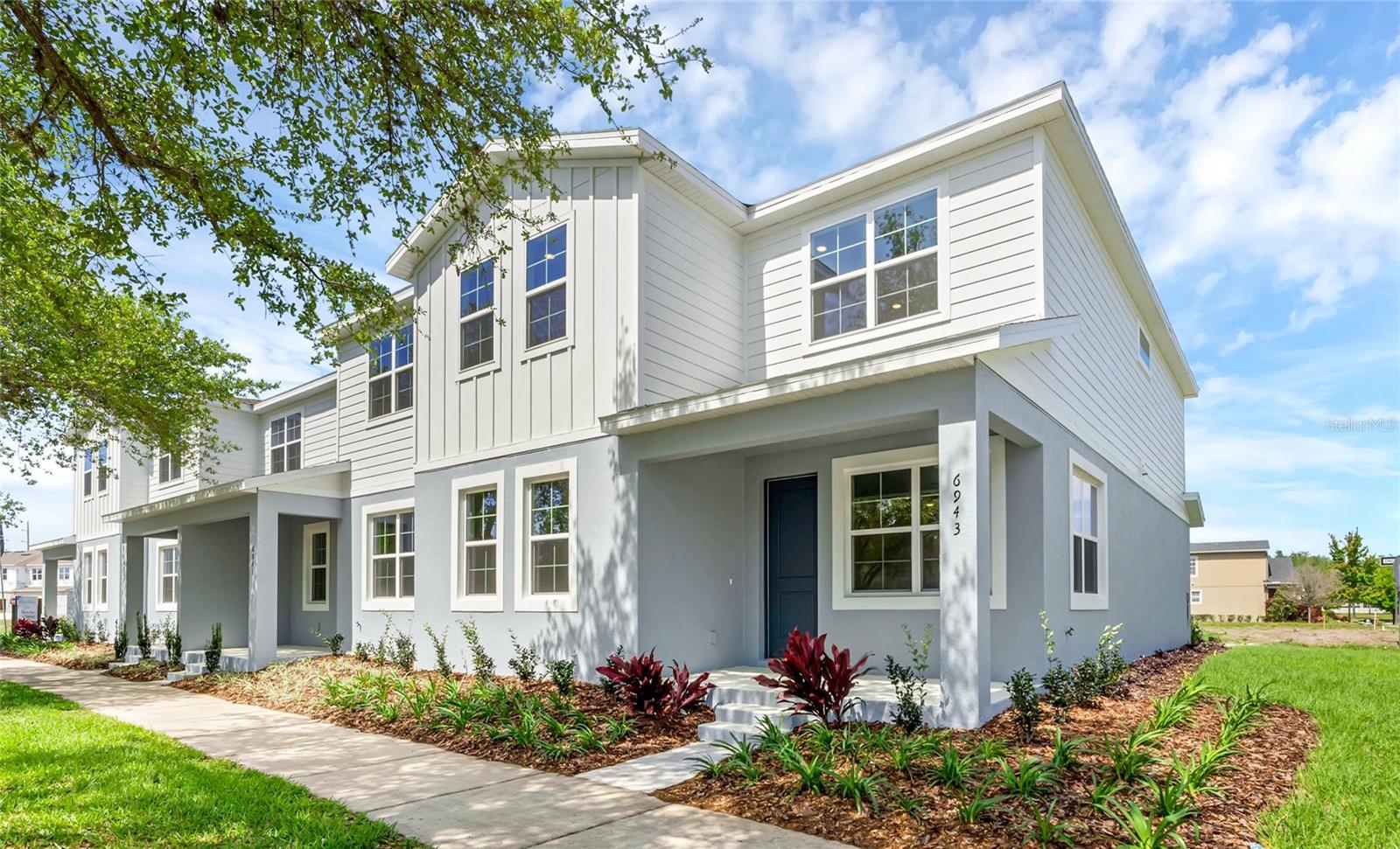 Welcome to Harmony Isle, a stunning community located within the amenity-rich Harmony neighborhood. Experience low-maintenance living in this master-planned community, offering a wide range of amenities such as community boat docks, golf courses, dog parks, a community garden, expansive trails, and recreational areas. Whether you're enjoying a day on Buck Lake, swimming in the pool, or taking a walk on the nature trails, you'll enjoy a resort-style lifestyle year-round with endless opportunities for relaxation and entertainment. Move in ready! Ask about our special interest rate opportunity! Discover the perfect blend of style and functionality in the Ellery 1—a spacious 4-bedroom, 2.5-bath townhome with an oversized 2-car garage. Step inside and you’ll find an open-concept first floor where the kitchen, dining area, and great room flow seamlessly together, ideal for everyday living and entertaining. The kitchen shines with white cabinets and sleek white frost quartz countertops, while luxury vinyl plank flooring extends throughout the main level for a modern, low-maintenance finish. A welcoming front porch adds charm and curb appeal. Upstairs, you’ll find all four bedrooms along with a conveniently located laundry room, keeping everything you need just steps away. DISCLAIMER: Photos and/or drawings of homes may show upgraded landscaping, elevations and optional features that may not represent the lowest priced homes in the community. Pricing, Incentives and Promotions are subject to change at anytime. Promotions cannot be combined with any other offer. Ask the Sales and Marketing Representative for details on promotions.