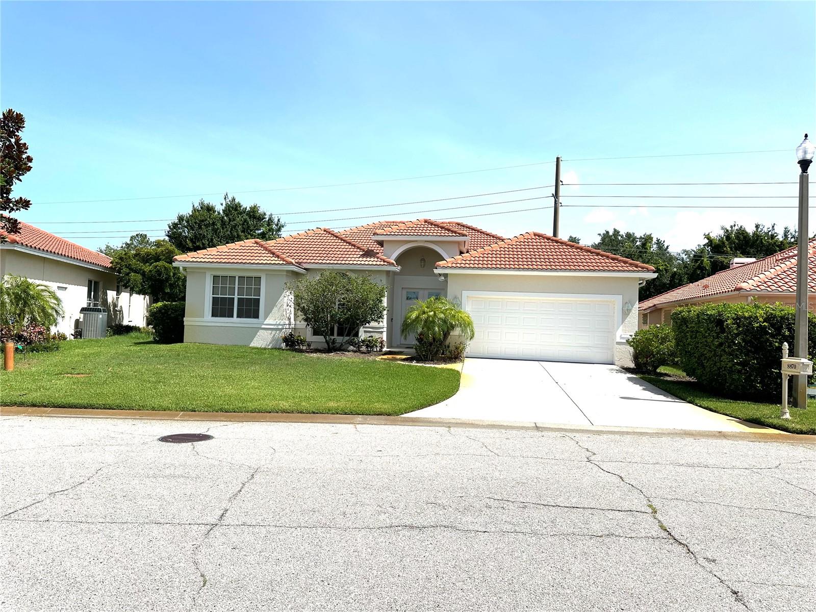 Welcome to this meticulously maintained and fully furnished residence is located in the Huntington Point gated community at Palmer Ranch. It offers a seamless fusion of comfort and Sarasota, Florida style. With 2400 sqft of living space, 3 bedrooms, and 2.5 bathrooms, this residence provides a welcoming atmosphere. The elegant luxury vinyl floors throughout the living areas create a warm and inviting ambiance. The heart of the home, a beautifully designed kitchen with new appliances and stunning granite countertops, provides ample space for culinary creations and casual gatherings. The spacious bedrooms offer a peaceful retreat, ideal for relaxation after a busy day at work or exploring Sarasota. Step outside to enjoy the Florida sunshine in your private heated pool and hot tub with a view of the lake and mature garden. Conveniently situated, this property grants easy access to local amenities, the Legacy Bike Trail, the renowned Siesta Key Beach, dining, and entertainment, making it a perfect choice for those seeking both tranquility and convenience. Moreover, families with children will appreciate its location in a highly-rated school district. Seize this opportunity and schedule a showing today to experience all that this home has to offer.