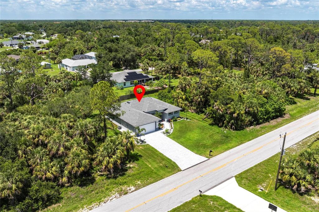 Photo of 14422 Chamberlain Boulevard, Port Charlotte, FL 33953 (MLS # D6143794)