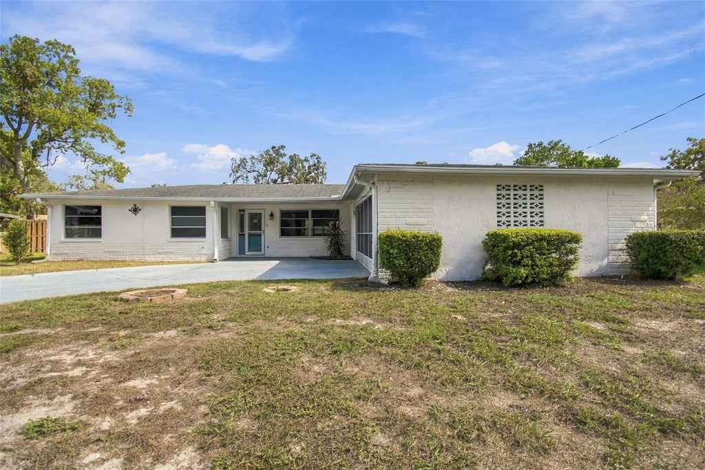 Photo of 7400 Hiawatha Parkway, Spring Hill, FL 34606 (MLS # TB8557036)
