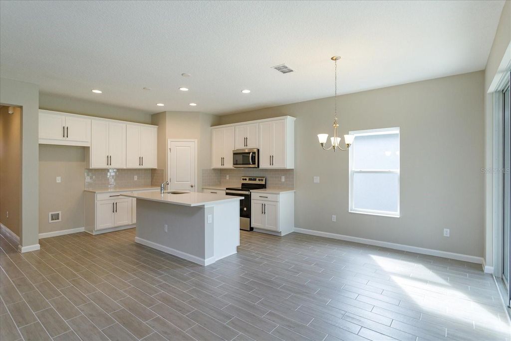 Photo of 413 Silver Palm Drive, Haines City, FL 33844 (MLS # G5103216)