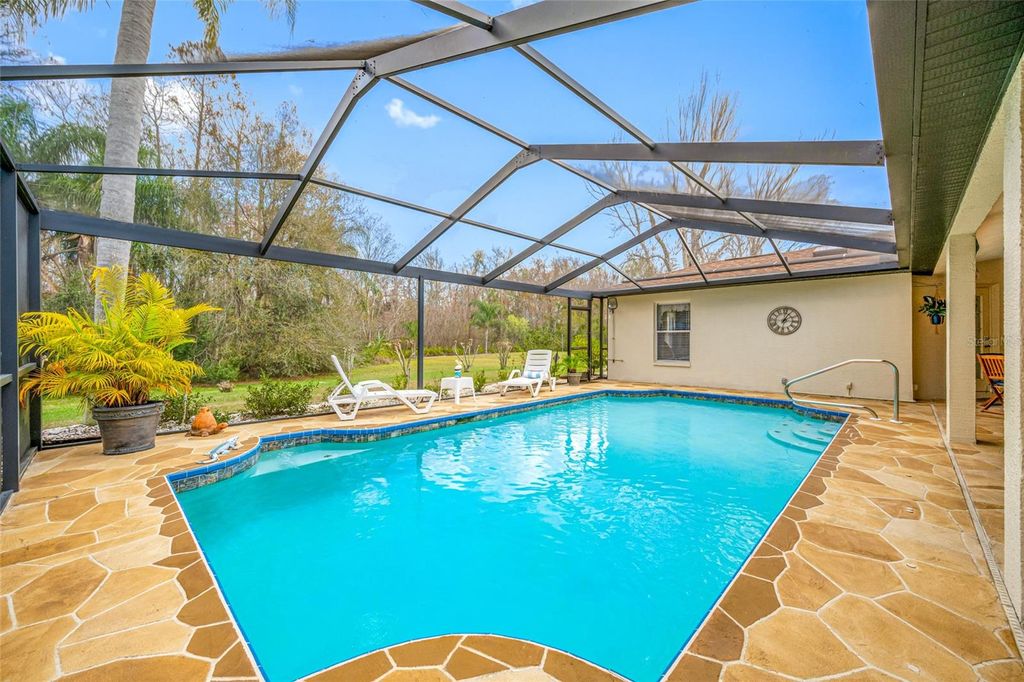 Photo of 1734 Kinsmere Drive, Trinity, FL 34655 (MLS # TB8350095)