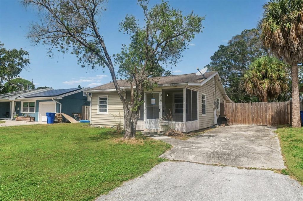 Photo of 319 80th Avenue NE, St Petersburg, FL 33702 (MLS # TB8322921)