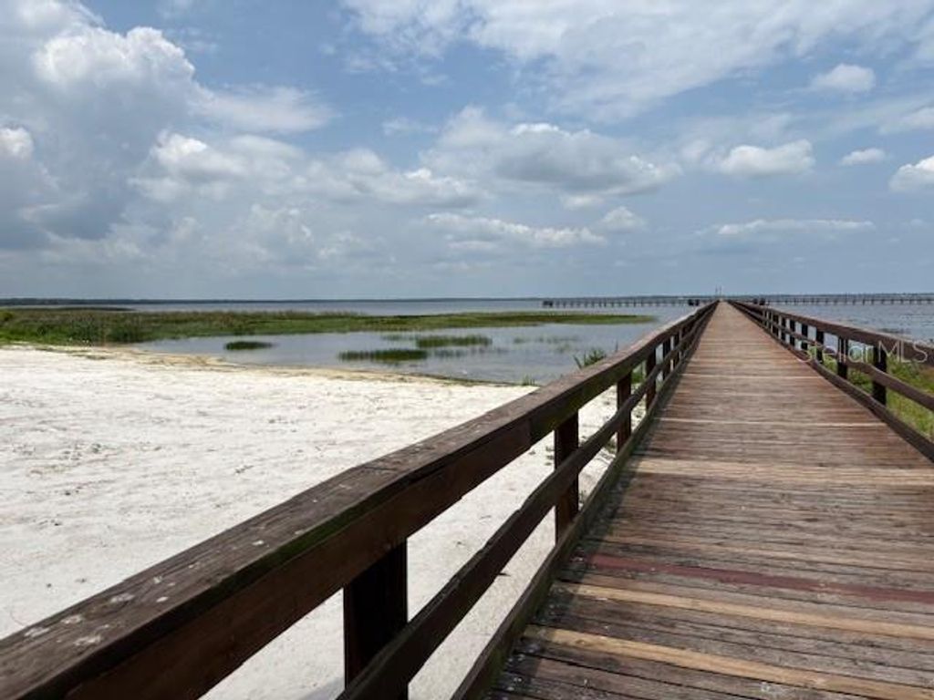 Photo of 213 Plumosa Drive, Indian Lake Estates, FL 33855 (MLS # TB8390207)