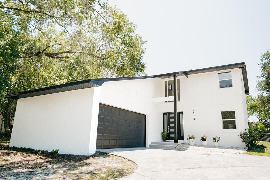 Photo of 18410 Sterling Silver Circle, Lutz, FL 33549 (MLS # TB8409628)