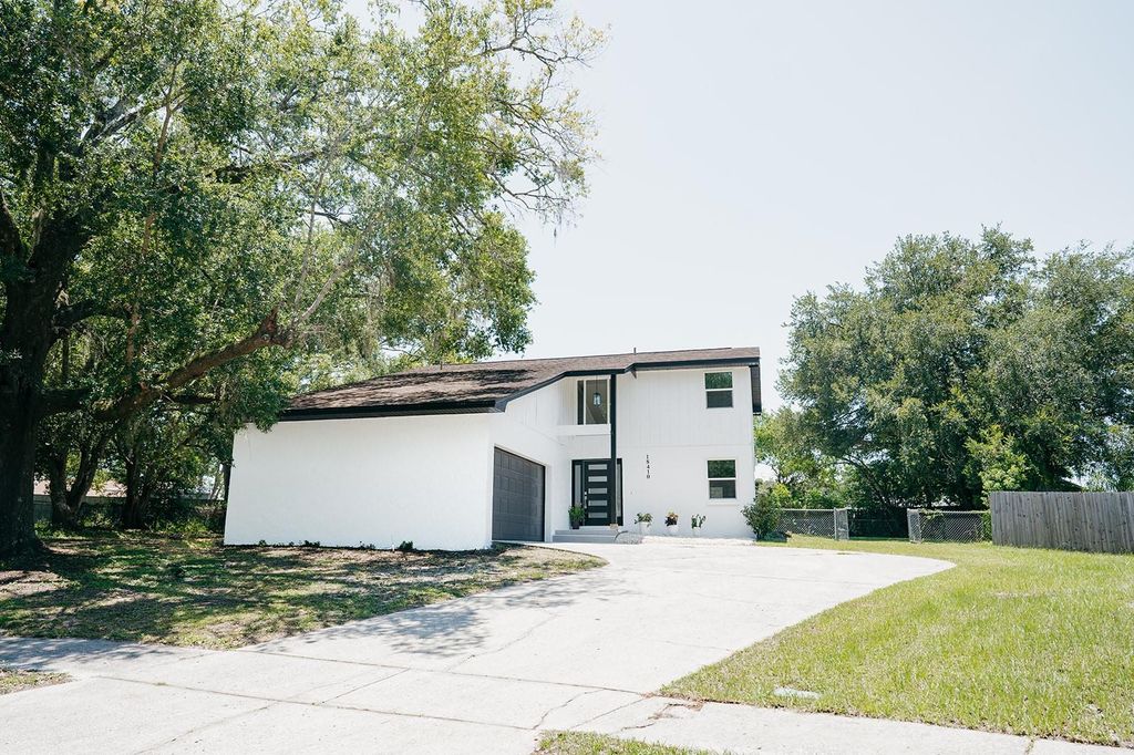 Photo of 18410 Sterling Silver Circle, Lutz, FL 33549 (MLS # TB8409628)
