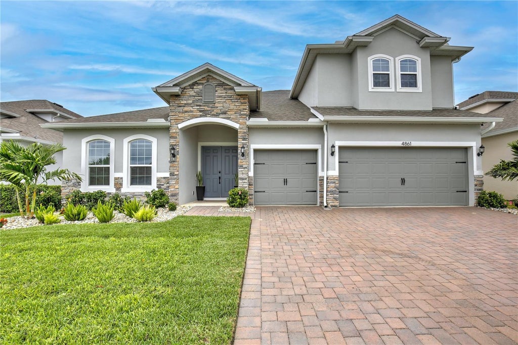Photo of 4861 Cragmere Loop, Clermont, FL 34711 (MLS # O6430769)