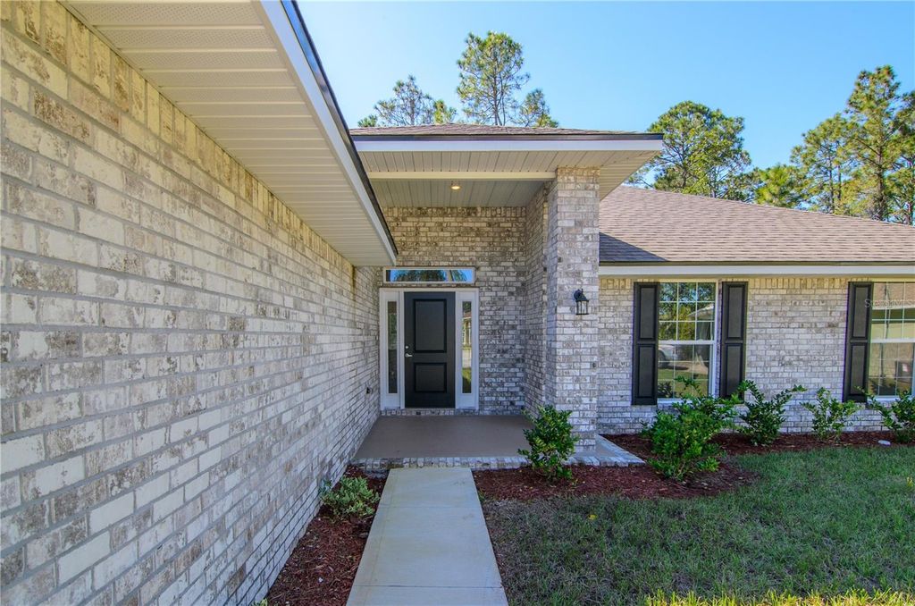 Photo of 31 Rybark Lane, Palm Coast, FL 32164 (MLS # FC314646)